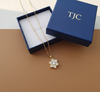 Anti - Tarnish Gold Plated Lotus Flower Star Shape Premium Chain Pendant with Cubic Zirconia Stones